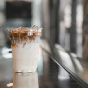 to go cup of iced coffee on a counter