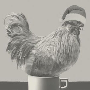a chicken laying on a cup of eggnog