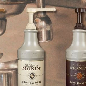 Monin Gourmet Sauces over an espresso machine