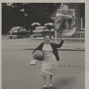 creamy frangelican woman balancing a glass of the liquor