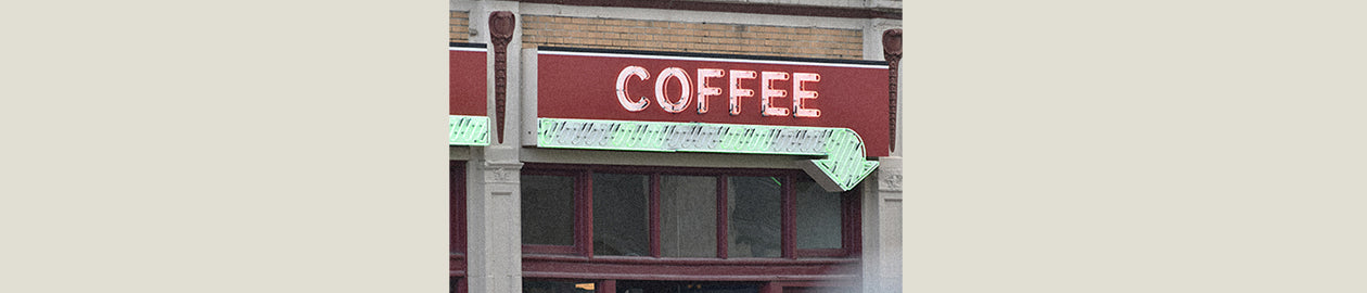 old coffee neon sign on diner window
