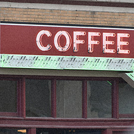 old coffee neon sign on diner window