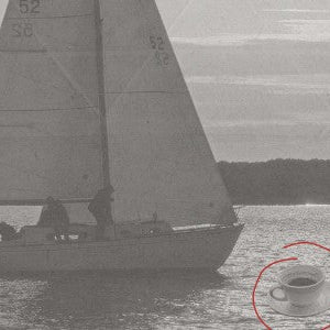 men on boat at sunset looking at a coffee floating on the ocean