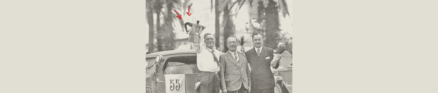 men holding brewing equipment by a vintage car